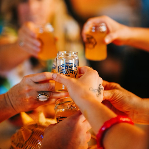 people cheers a drink