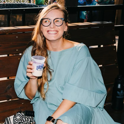 woman enjoys fronzen drink